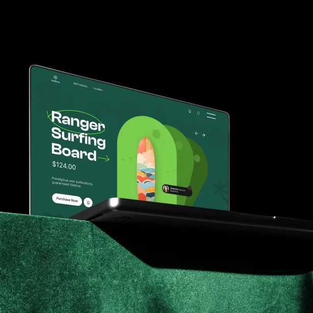 Surfboard e-commerce website design shown on a laptop
